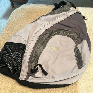 Purple sling backpack